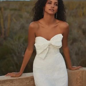 Anthropologie Hutch Eyelet Bow Tie Mini Dress